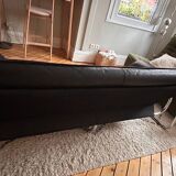 Black leather sofa designed by Johan Bertil Häggström