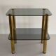 Side table in thick greenish glass with brass legs, Italy, 1960s.