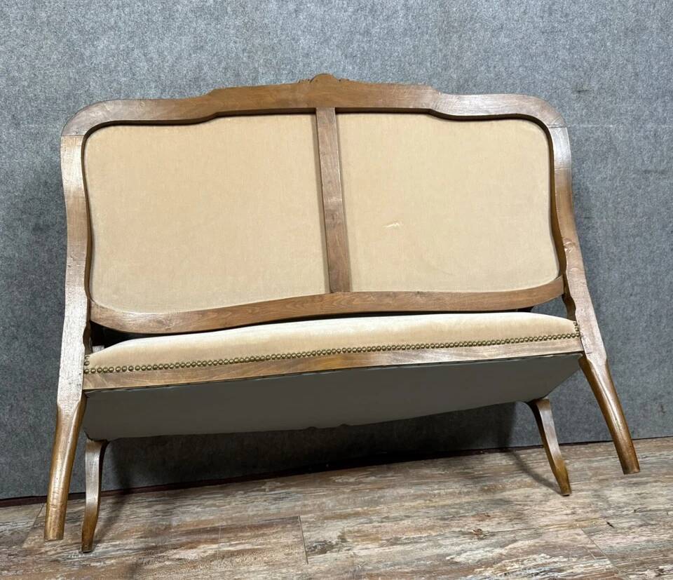 Louis XV style bench in molded and carved wood circa 1900