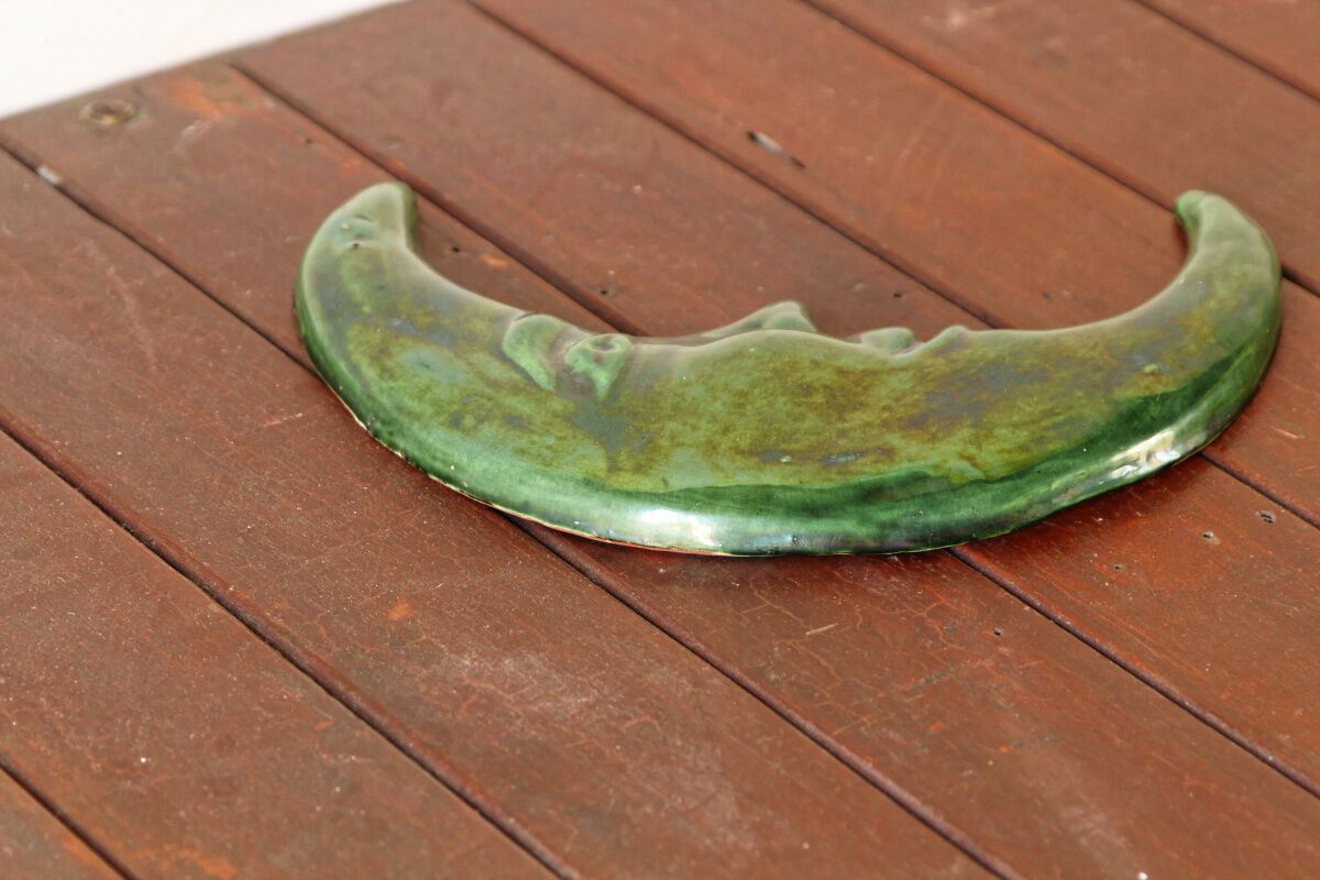 Glazed terracotta moon