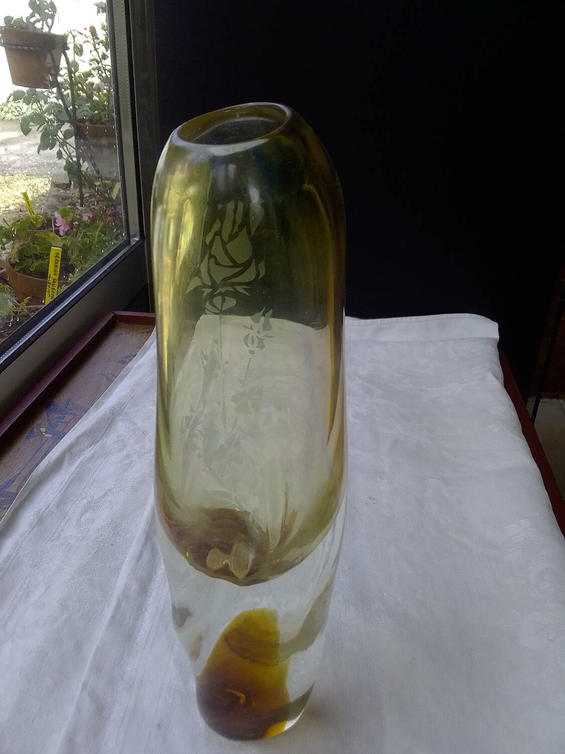 Amber-colored engraved crystal vase