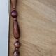 Miroir bohème vintage en perles de bois