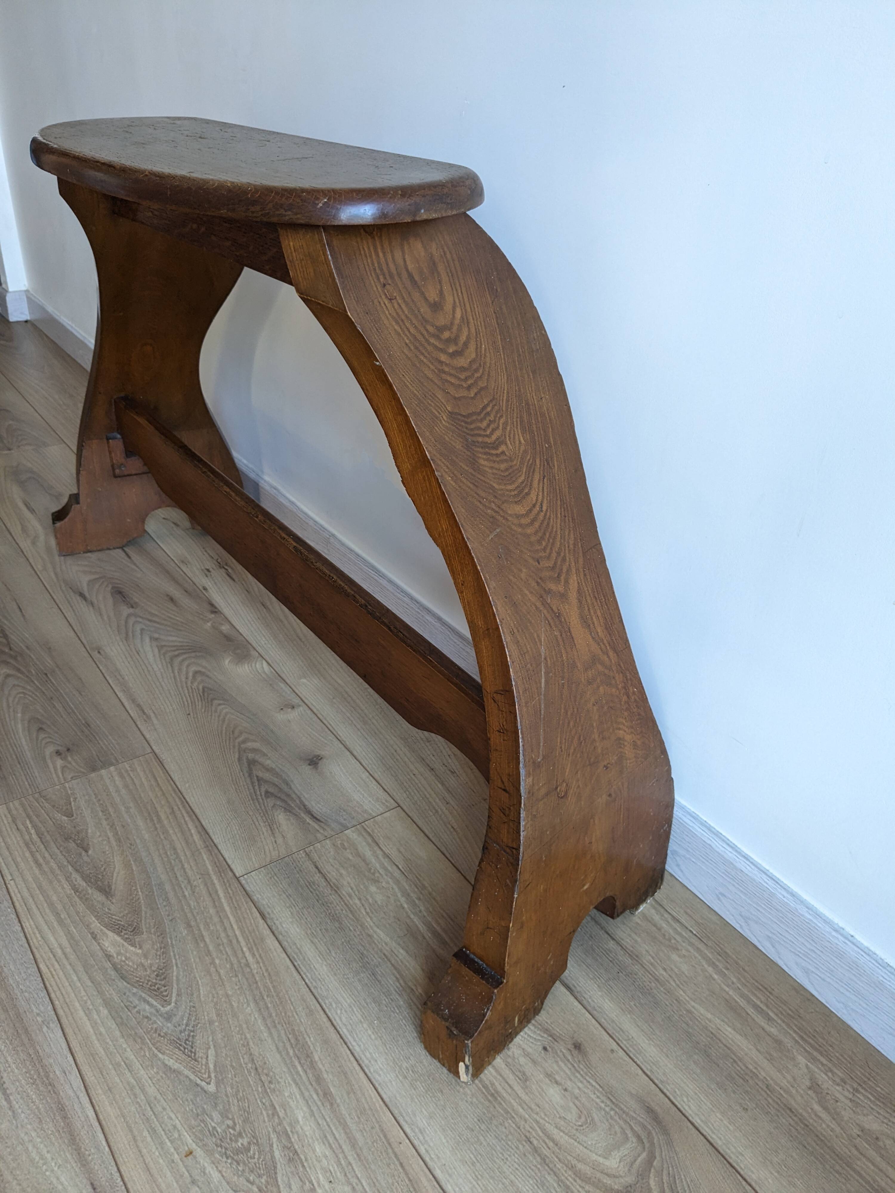 Old church organ bench in Art Nouveau style made of solid oak.
