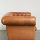 Sheepskin 2.5-seater Chesterfield sofa in a light cognac colour