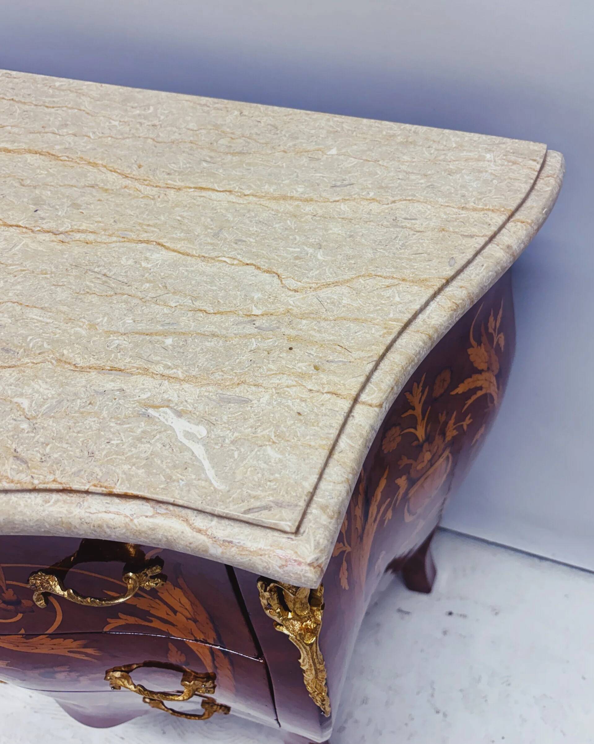 Marquetry chest of drawers with marble top in Louis XV style