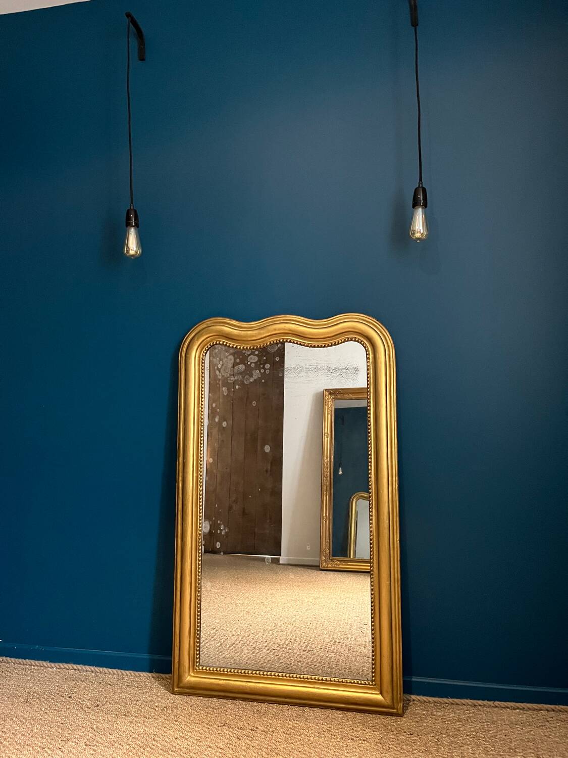 Louis-Philippe mirror 126.5cm/75.5cm gendarme hat shape, mercury glass