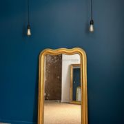 Miroir Louis-Philippe 126,5cm/75,5cm forme chapeau de gendarme, glace au mercure
