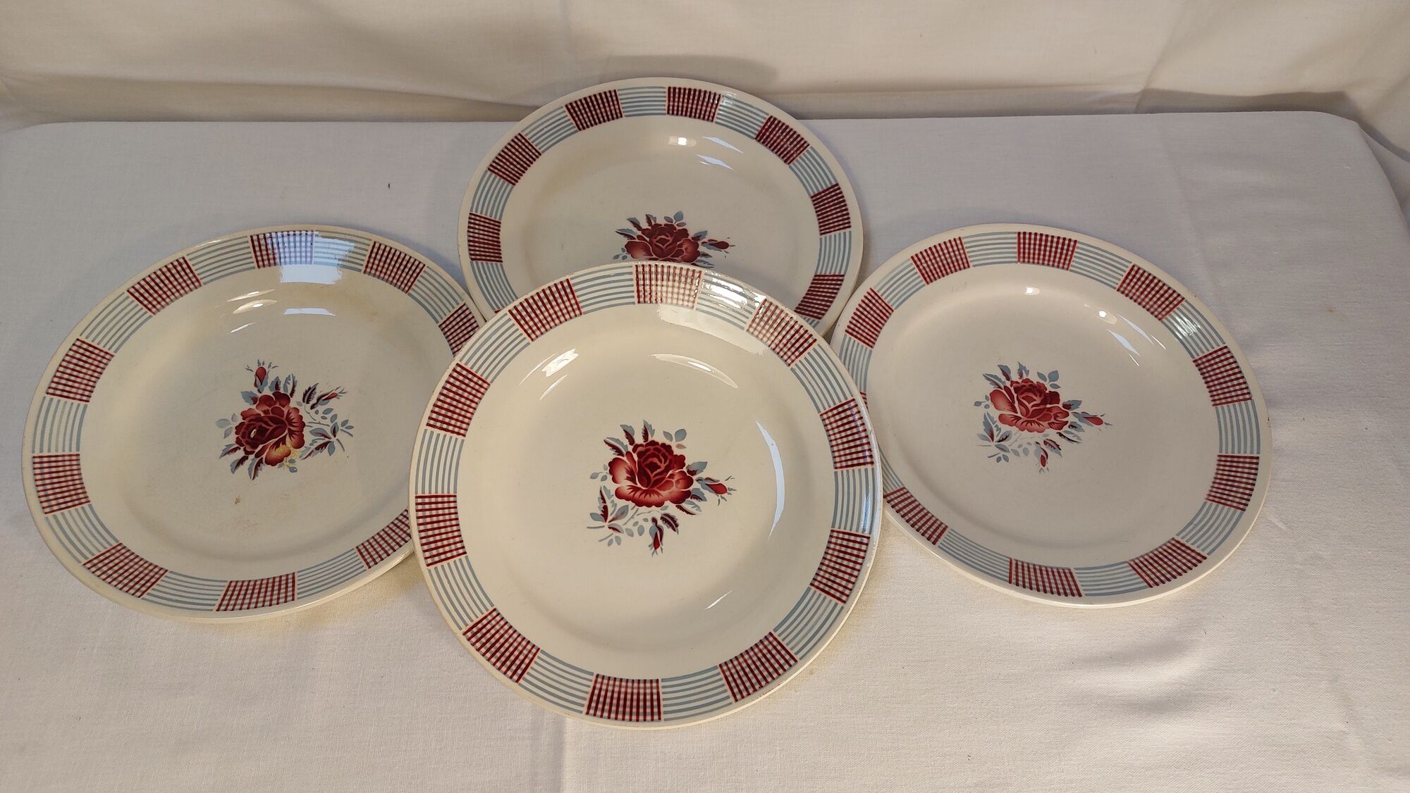 Set of 4 old flat plates from the earthenware factories of St Amand