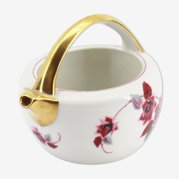Antique porcelain teapot pourer