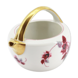 Antique porcelain teapot pourer