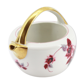 Antique porcelain teapot pourer