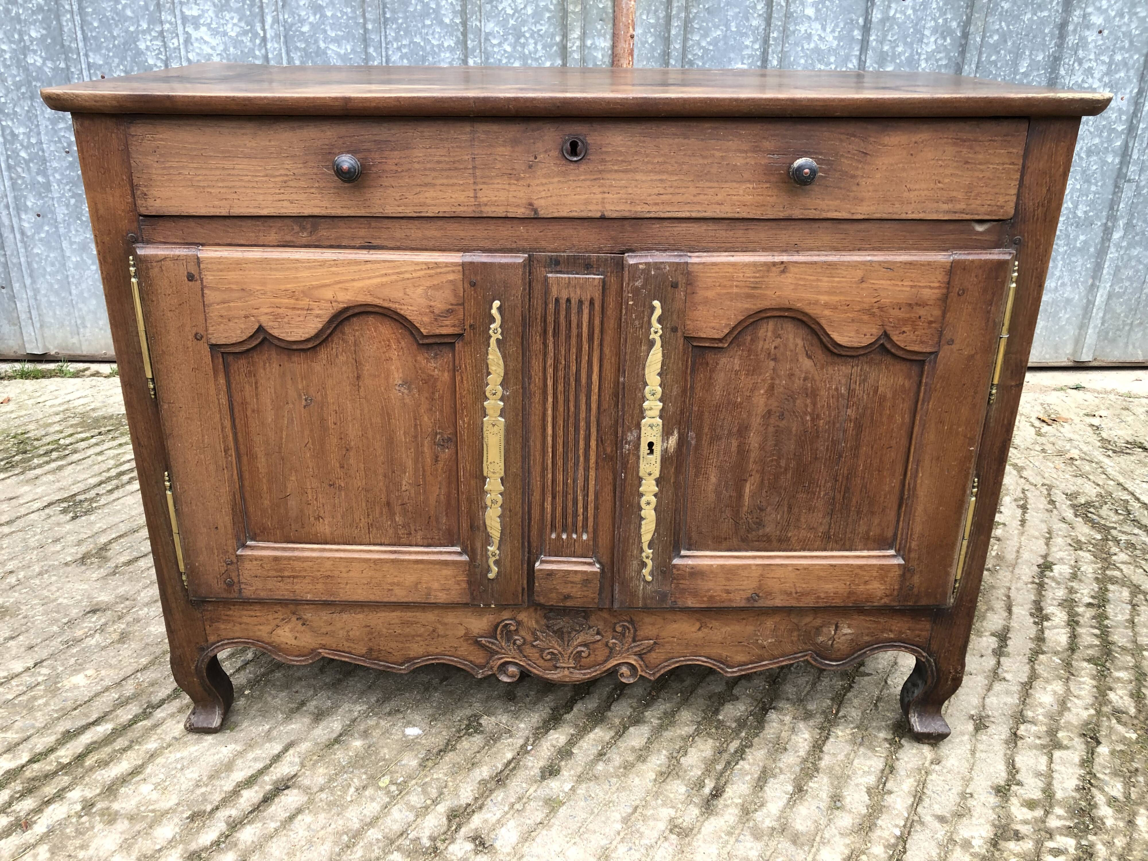 Antique Louis XV low chestnut sideboard with 2 doors and 1 drawer.