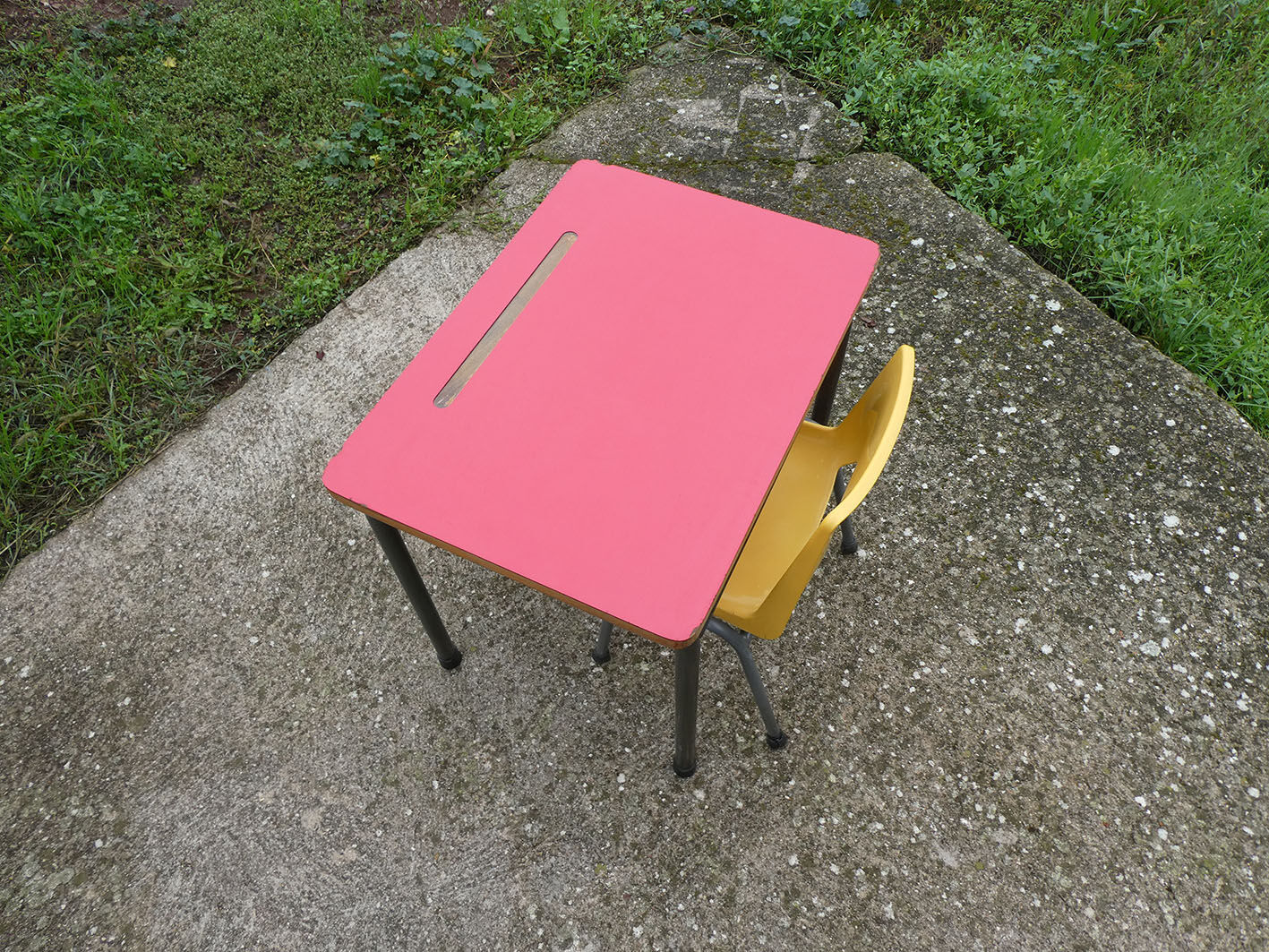 Child desk and vintage schoolboy chair