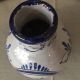 Small white decorative vase with blue floral decoration