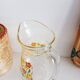 Carafe en verre à décor floral, années 70