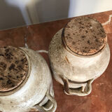 Two old stoneware pots with pickles and olives signed Jacque pouchain