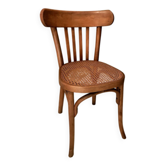 Old bistro chair with caned seat