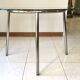Table ronde design 1970 en verre et métal