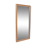 Mirror in a gold frame.