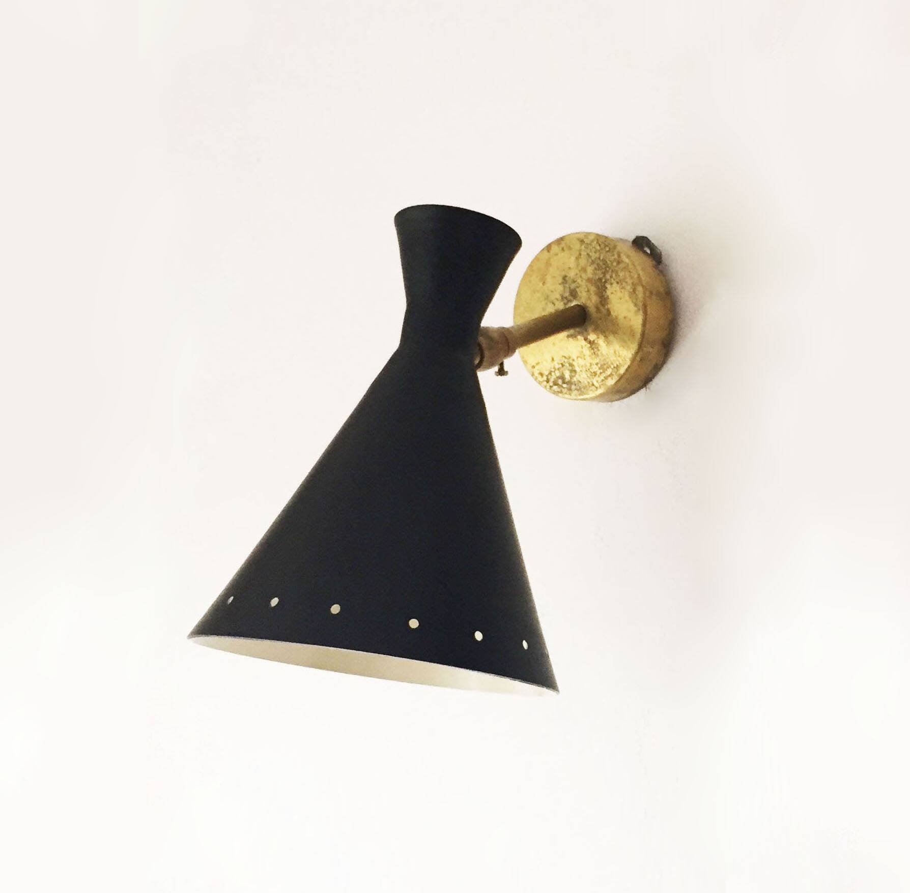 Set of three Italian wall lights in brass and lacquered iron, 1950s design.