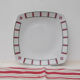 Set of basque porcelain green and red plates with 1 oval dish