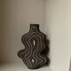 Raw black stoneware vase