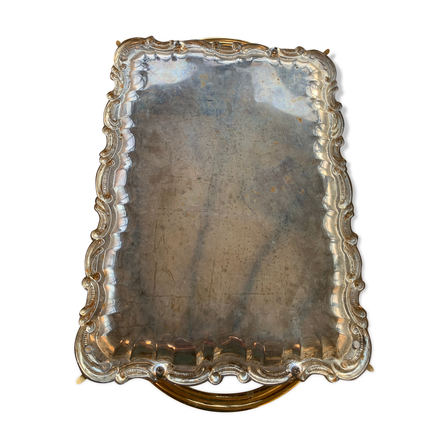 Silver metal top and decoration of foliage and handles in vintage brass