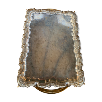 Silver metal top and decoration of foliage and handles in vintage brass