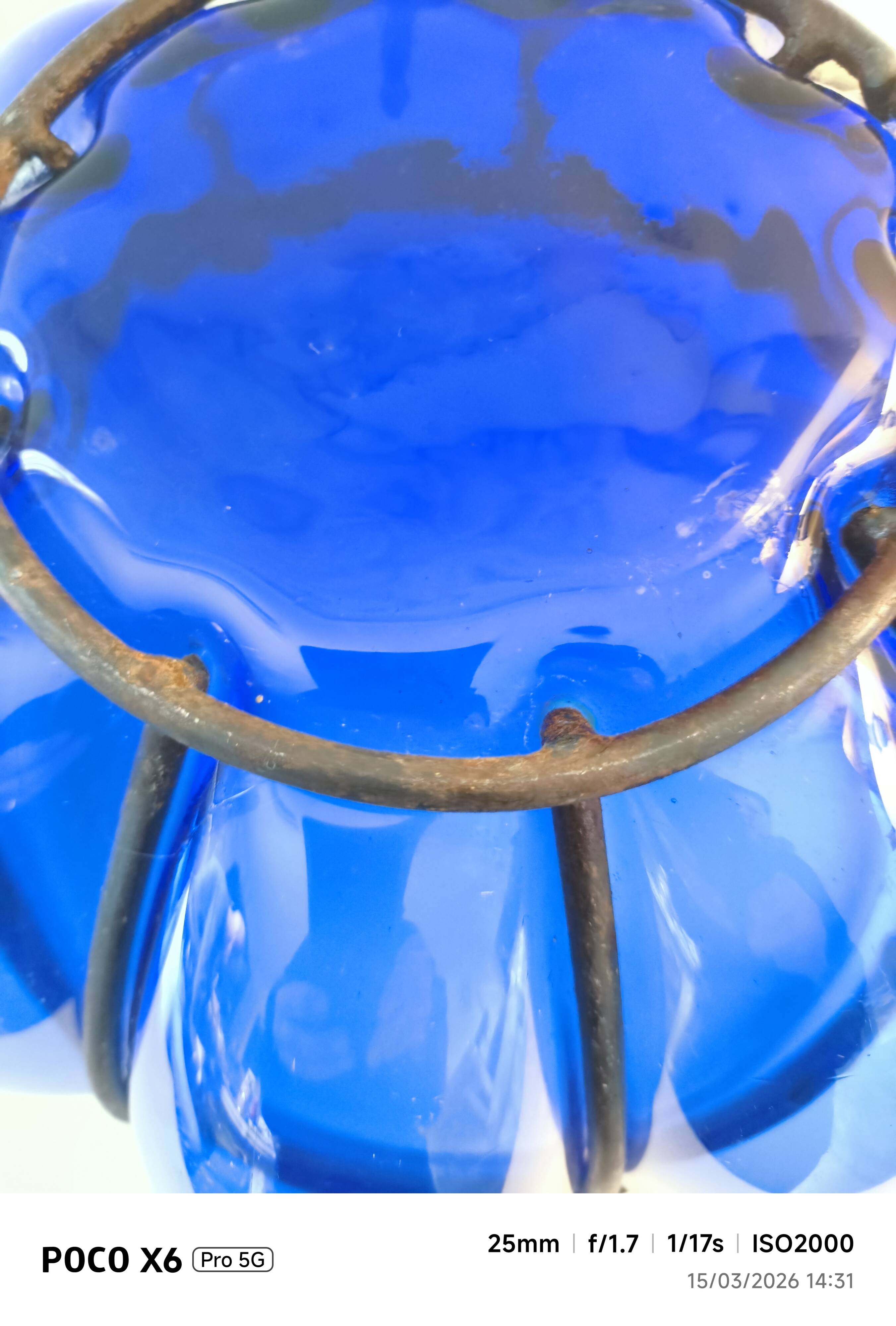 Superb vintage blown glass bowl in cobalt blue with its iron frame.