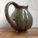 Green enamelled sandstone pitcher