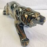 Art Deco lion statue 1930 cracked Saint Clément