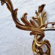 Pair of vintage French wall sconces in bronze, Louis XV Rococo style.