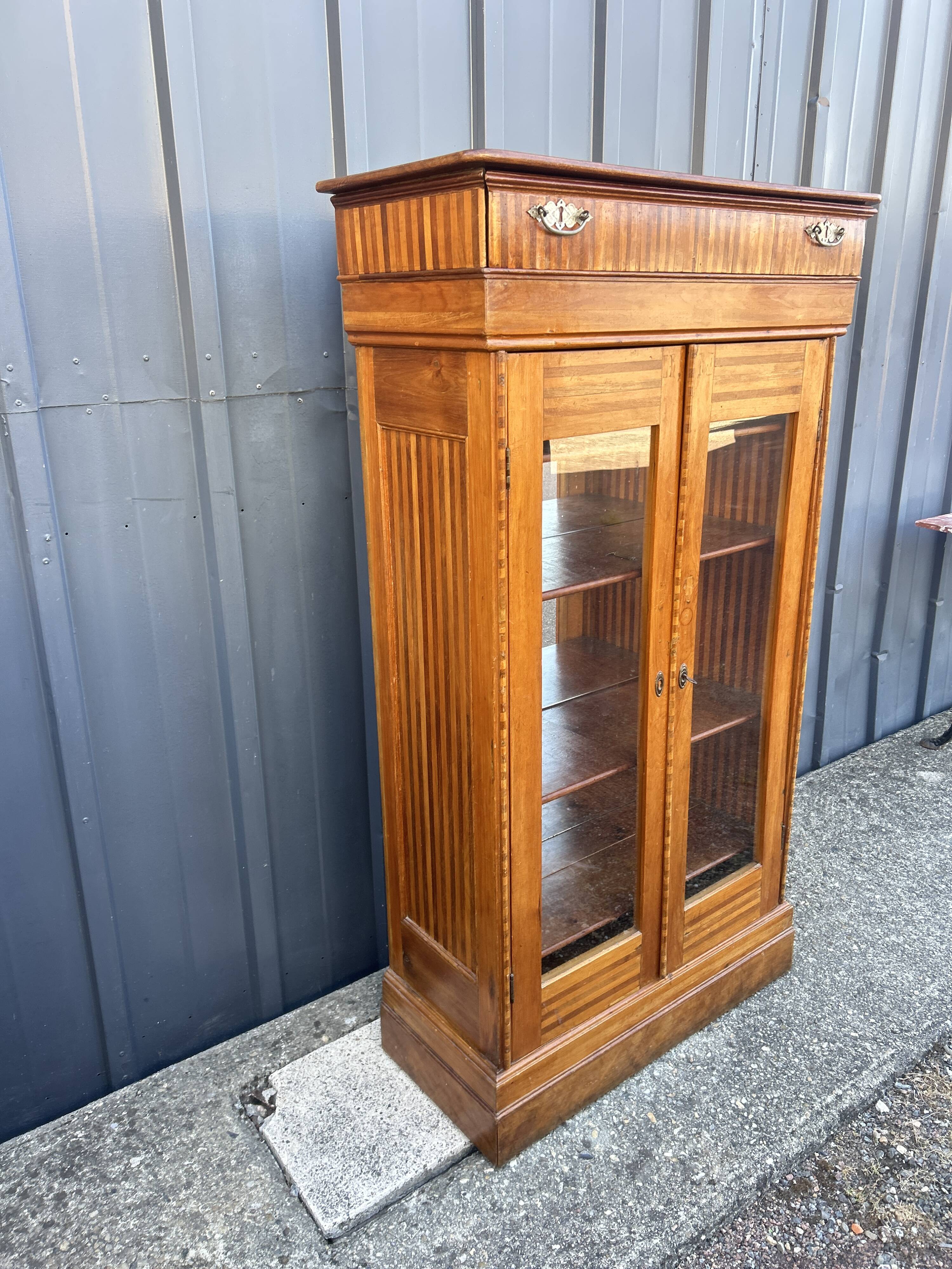 Two-door mahogany display cabinet