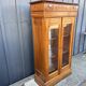 Two-door mahogany display cabinet