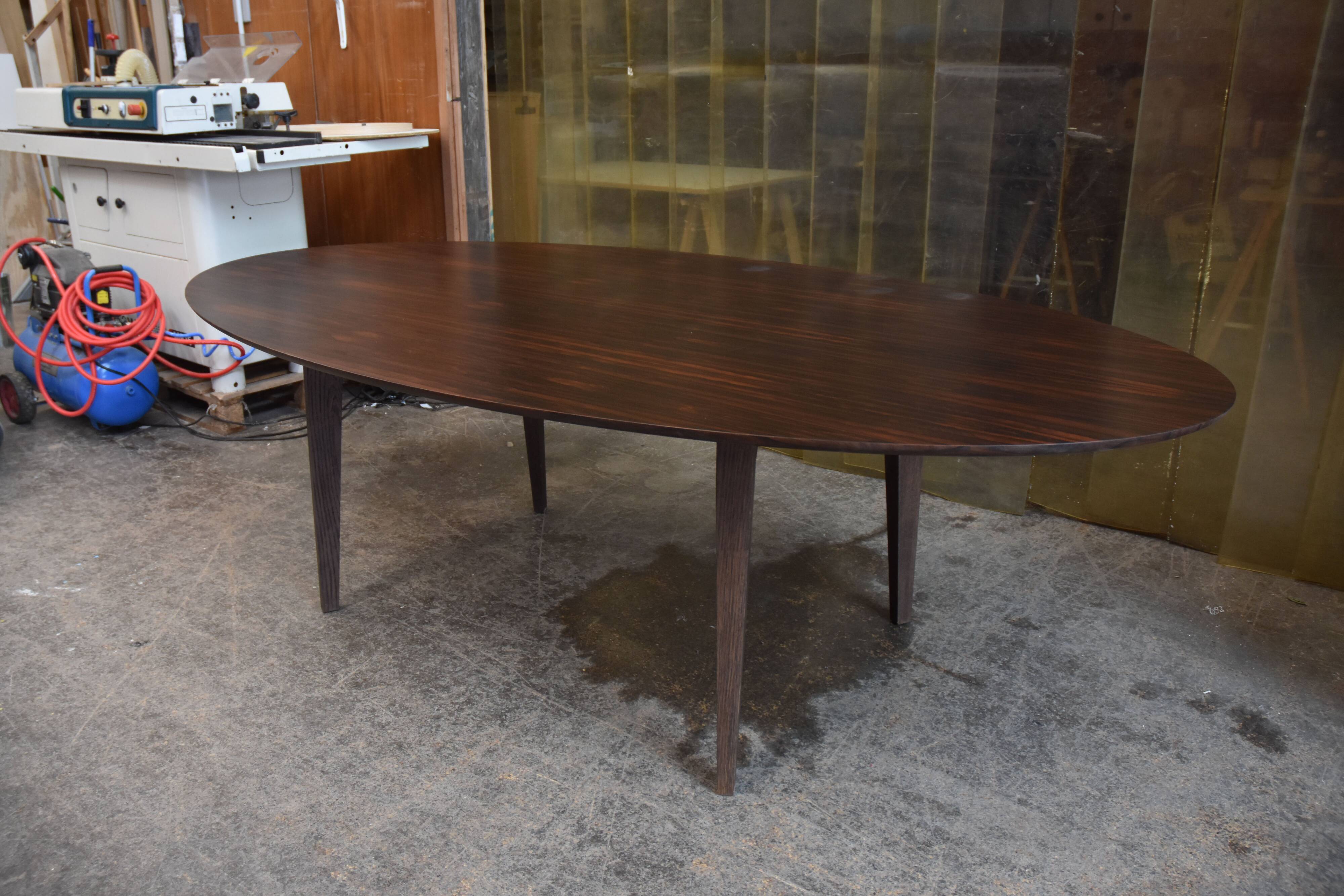 Oval table in ziricote and solid oak