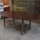 Oval table in ziricote and solid oak