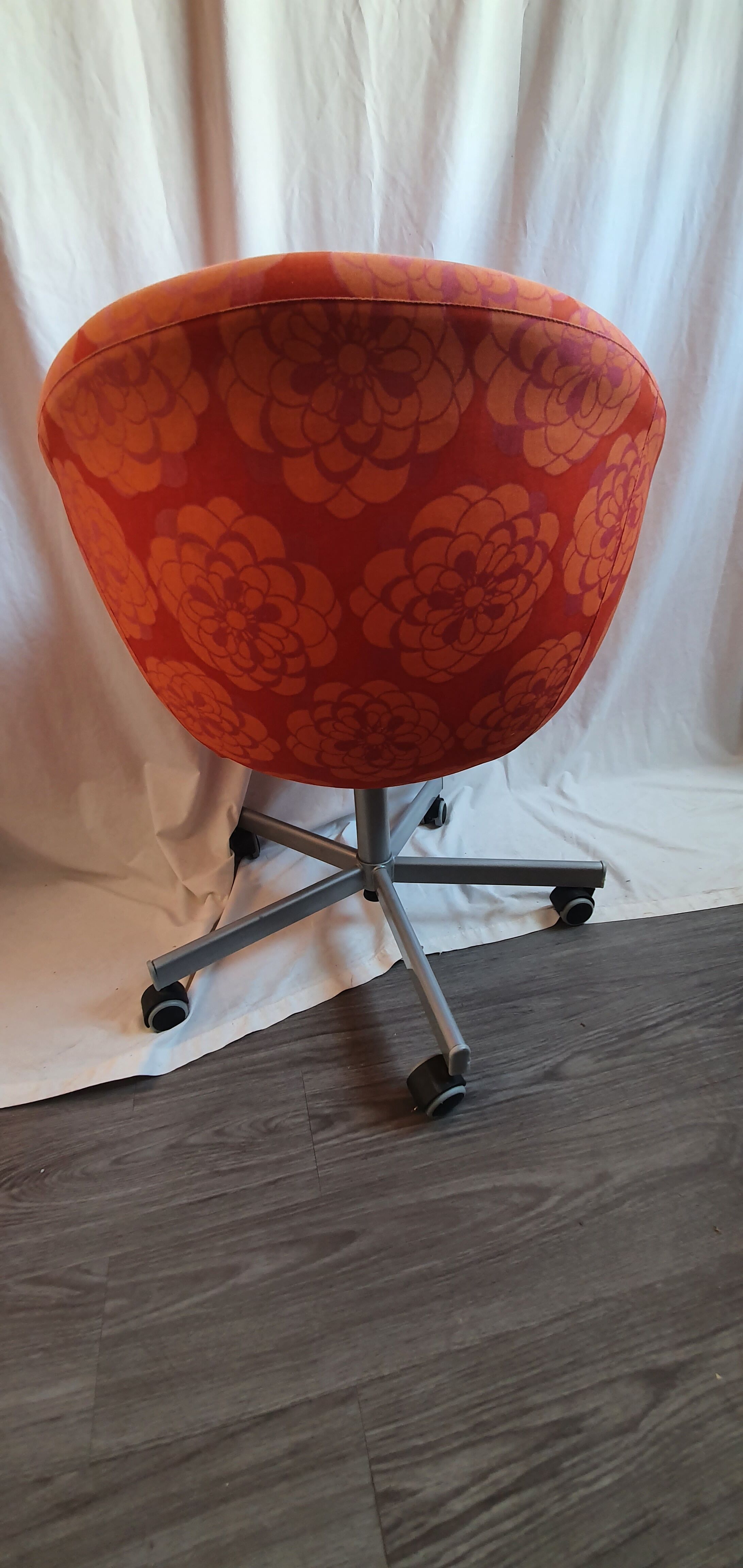 Seventies wheeled basket armchair