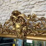 Pedimented mirror 184.5cm/135cm gilded with gold leaf
