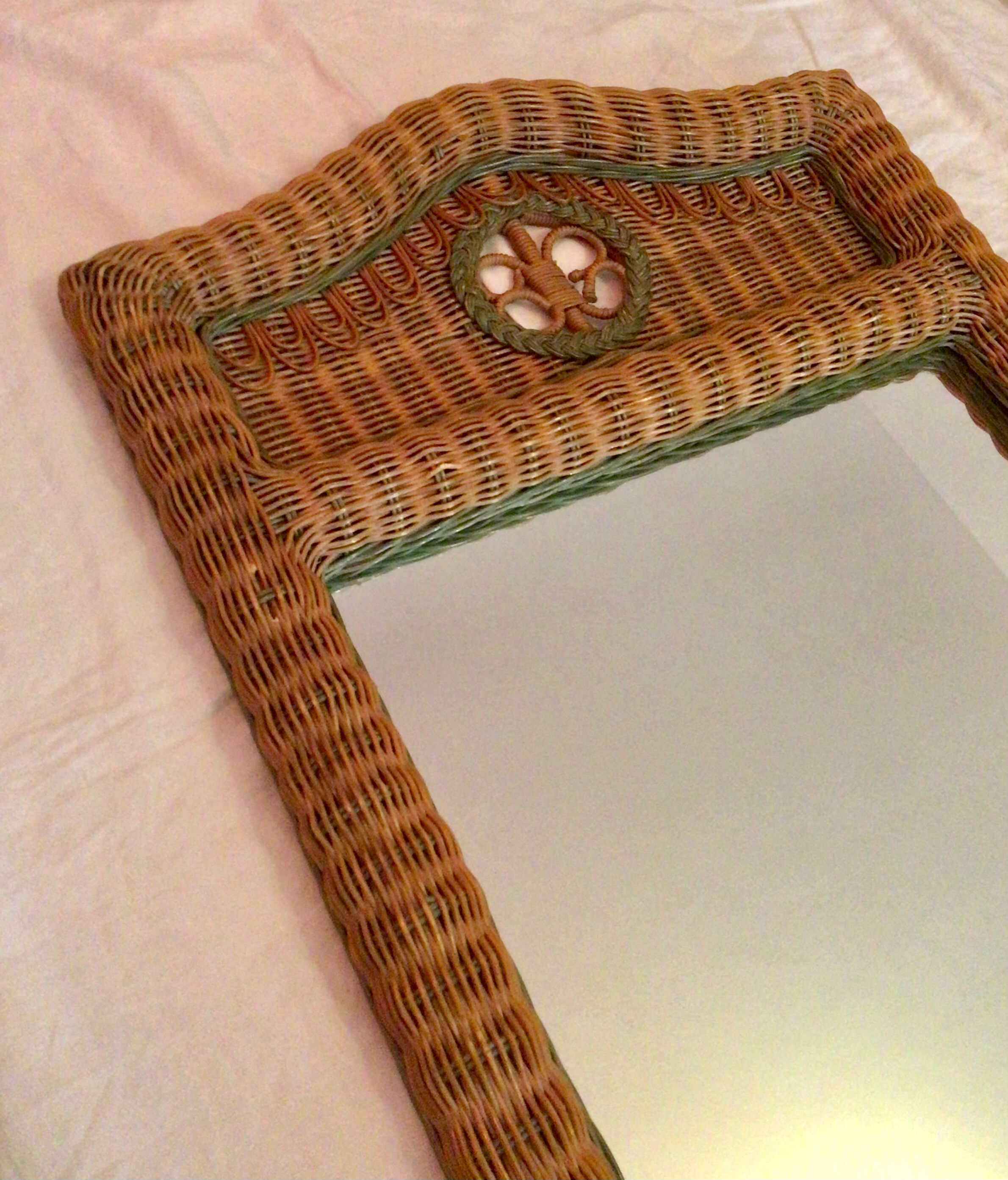 Vintage braided rattan mirror.