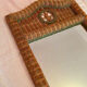 Vintage braided rattan mirror.