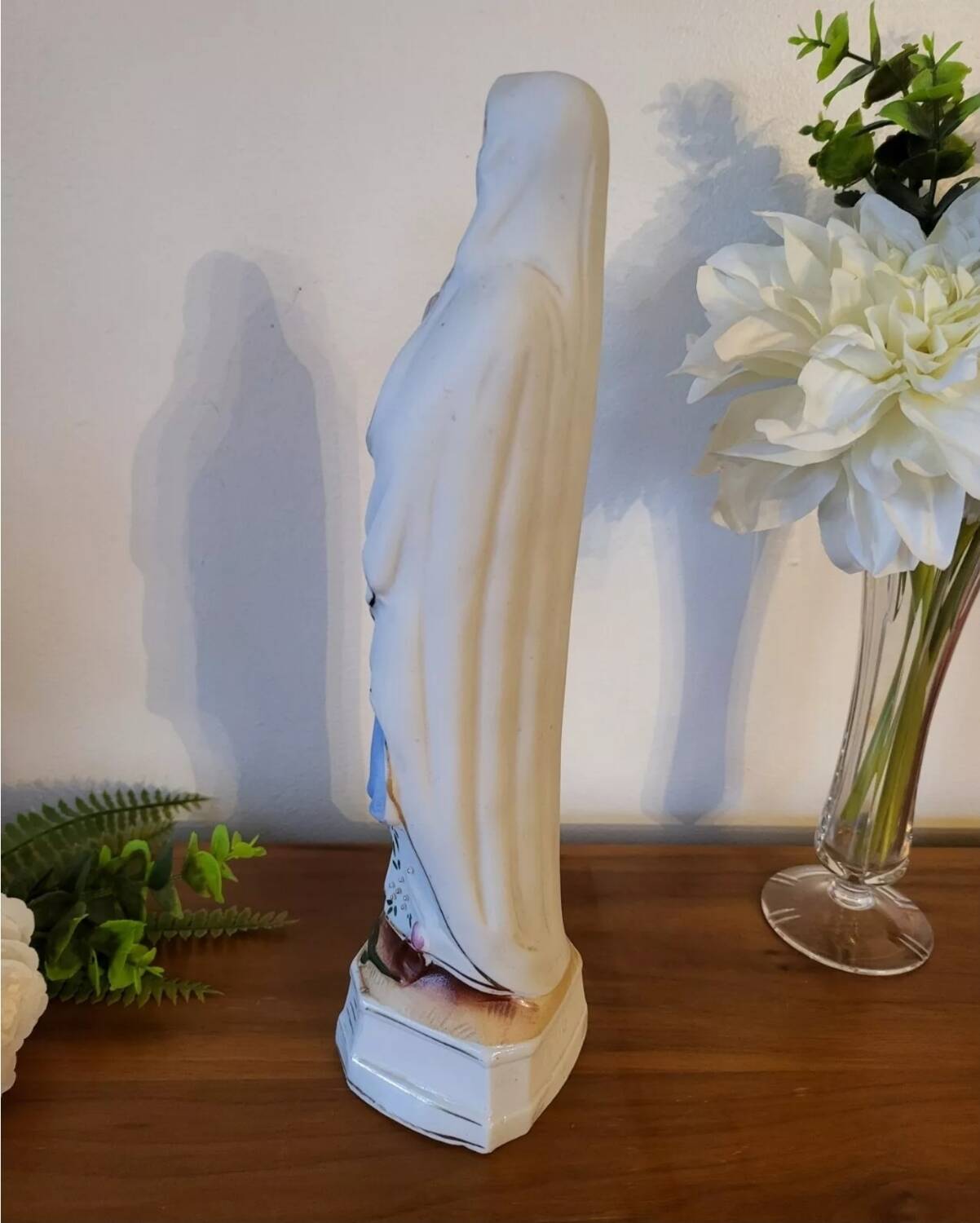 Religious statuette of the Virgin Mary in bisque porcelain
