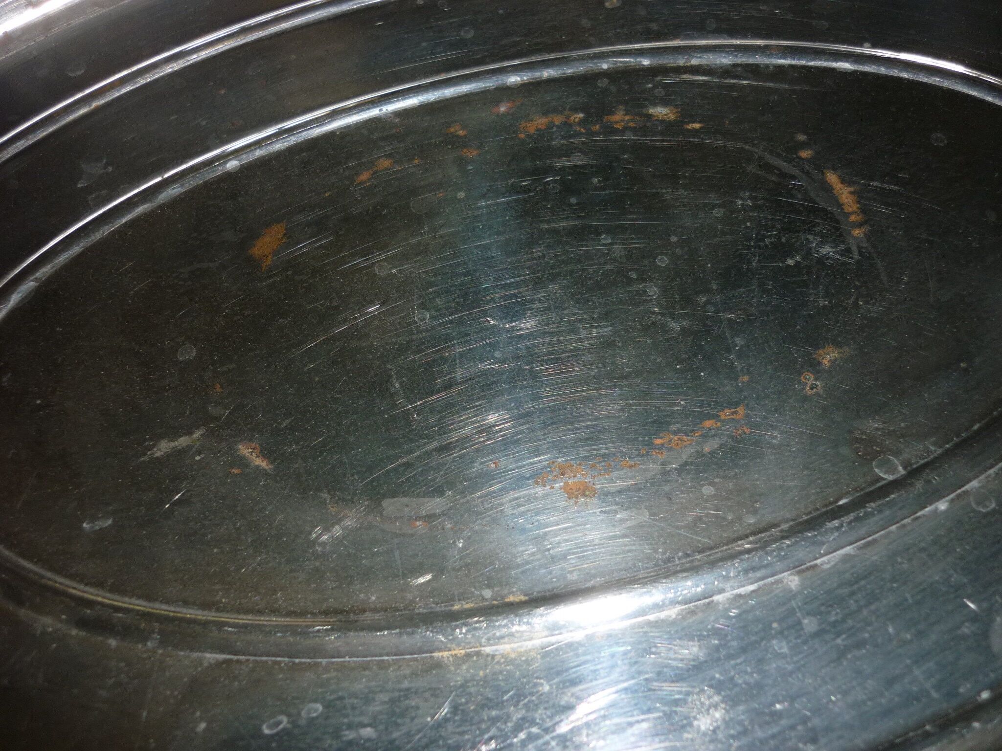 Silver metal oval top