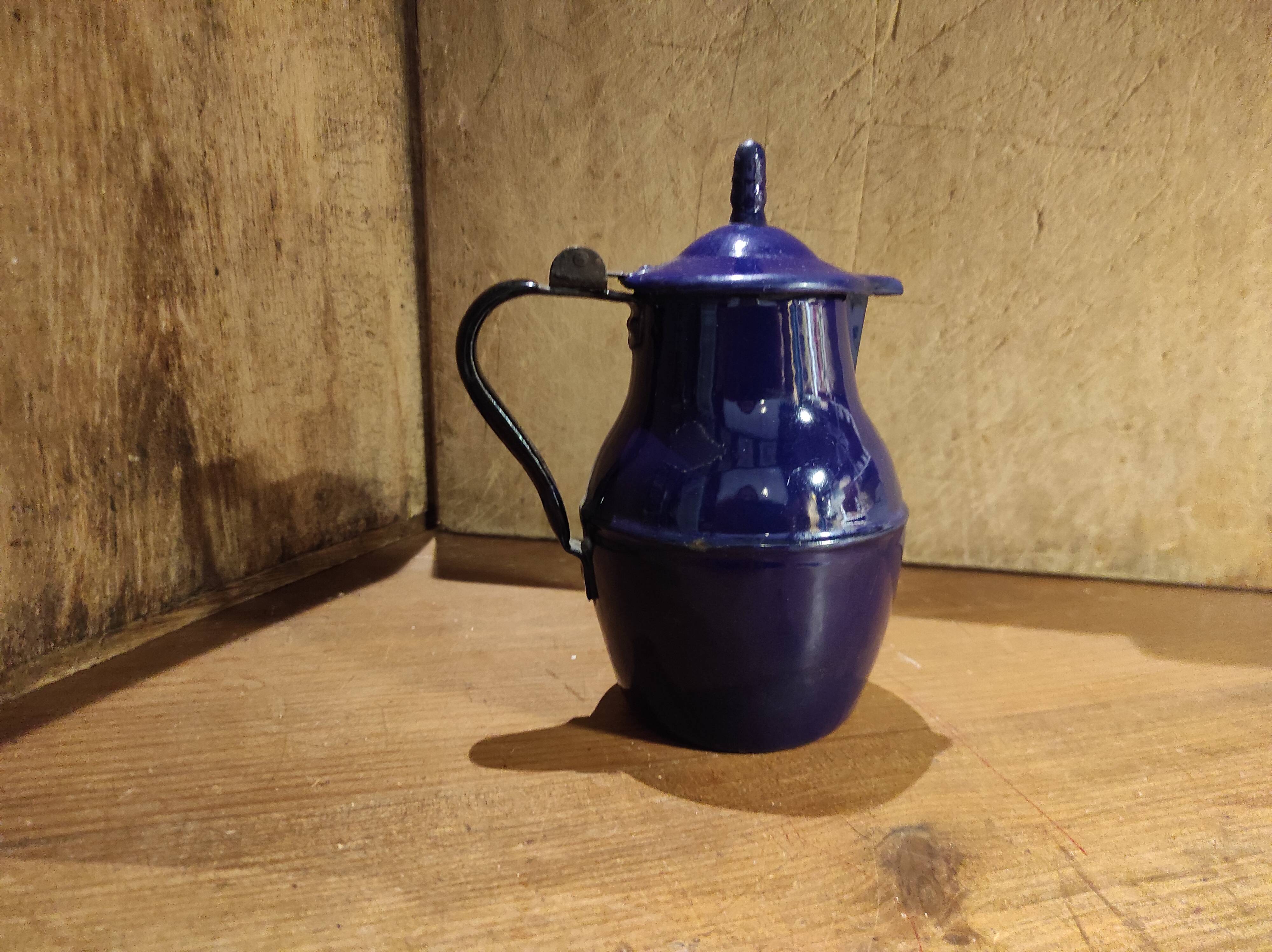 Small vintage French jug with lid, in blue enamel