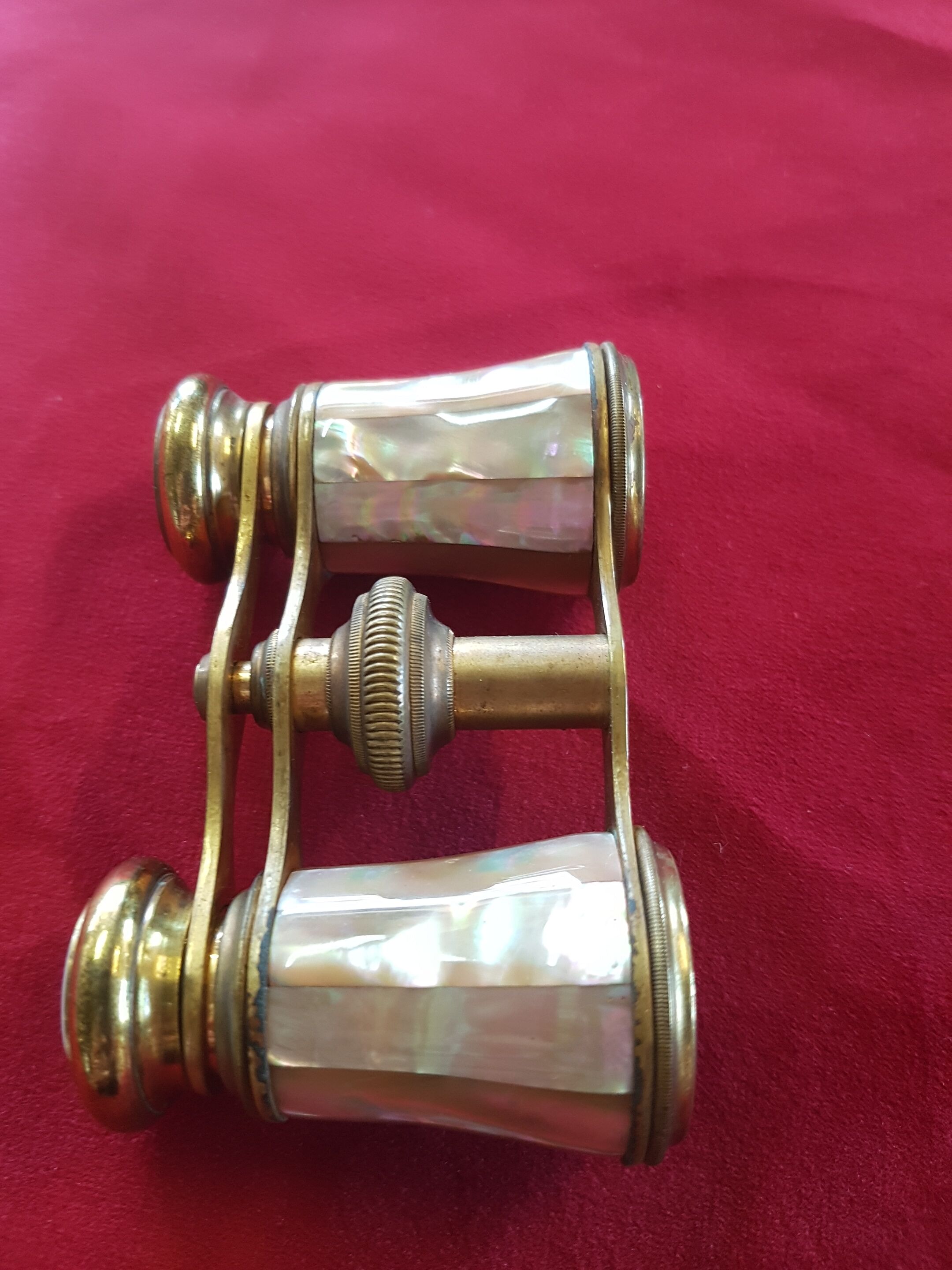 Brass and mother-of-pearl theatre twins