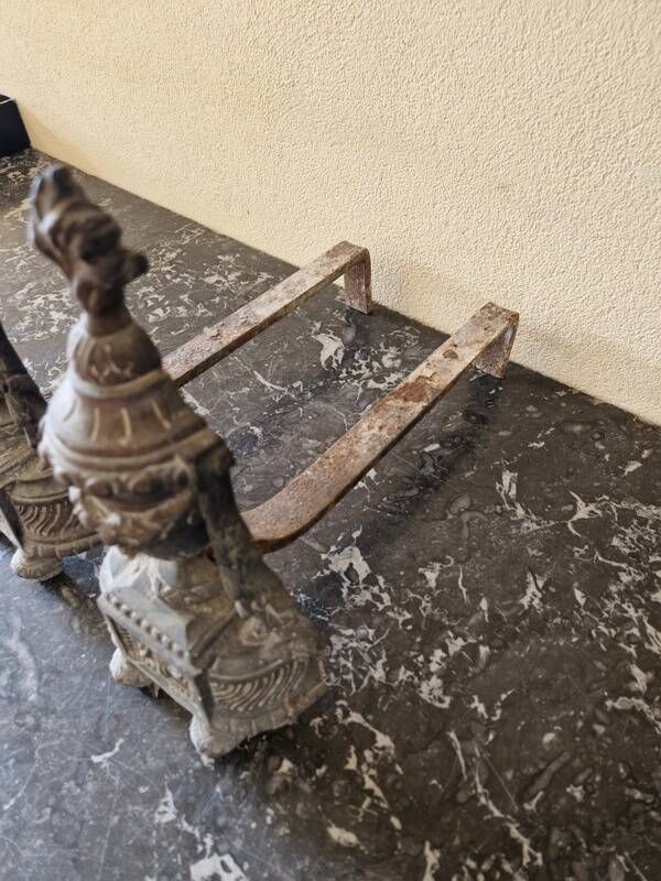 Pair of bronze andirons in Louis XVI style, late 19th century.