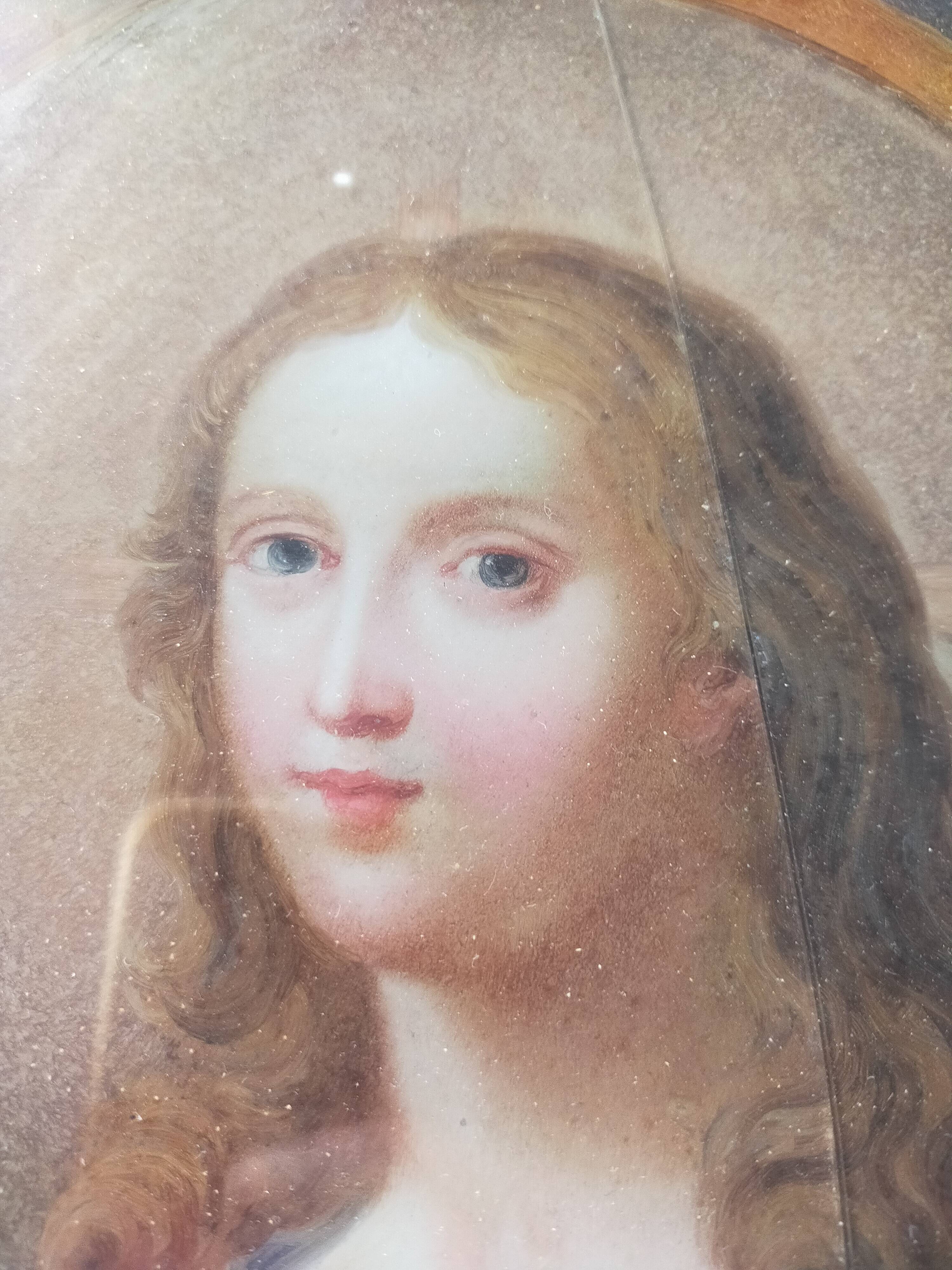 Ancient painting on glass depicting a female figure XVlll century