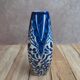 Small antique vase in blue and white earthenware, hand-painted – oriental decoration.