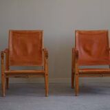 Kaare Klint, a pair of Safari chairs in ash and leather, Rud. Rasmussen, 1960s.