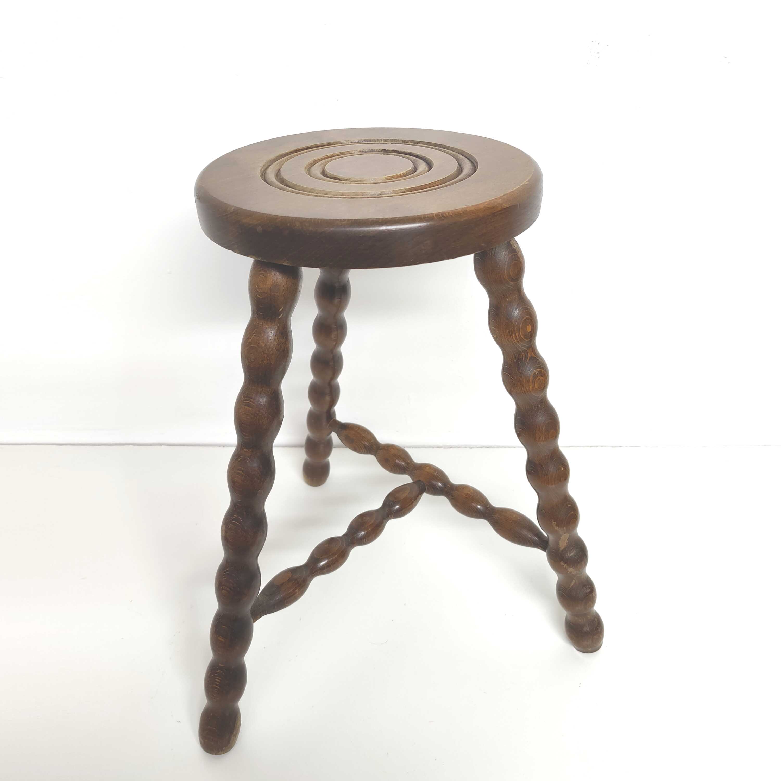 Vintage tripod stool in solid wood beaded legs