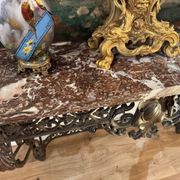 Console in wrought iron from the Napoleonic III period with a red Rance marble top.